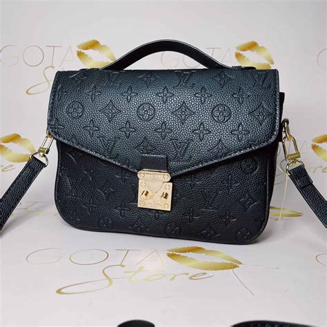 louis vuitton black embossed bag.